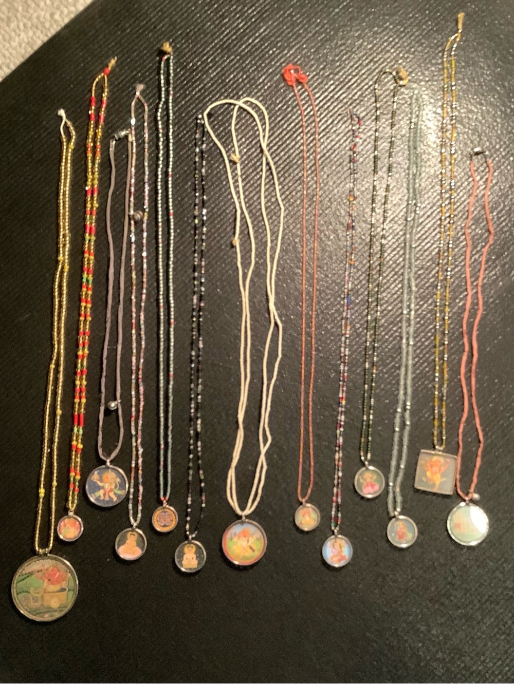 Indian Jewelry- 13 miniature hand painted pendants with gold accents on beads
